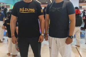 Putu Winasa, pembina(kiri) 